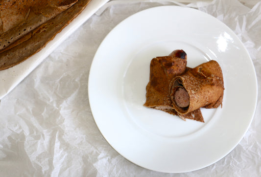 Galette saucisse et sa compotée d'oignons